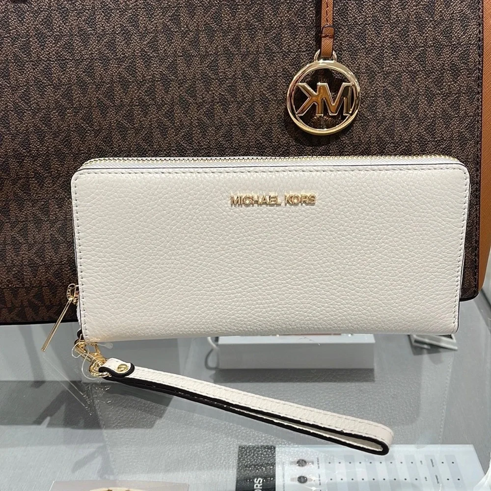 MICHAEL KORS LARGE TRAVEL CONTINENTAL WRISTLET WALLET OPTIC WHITE COLOR